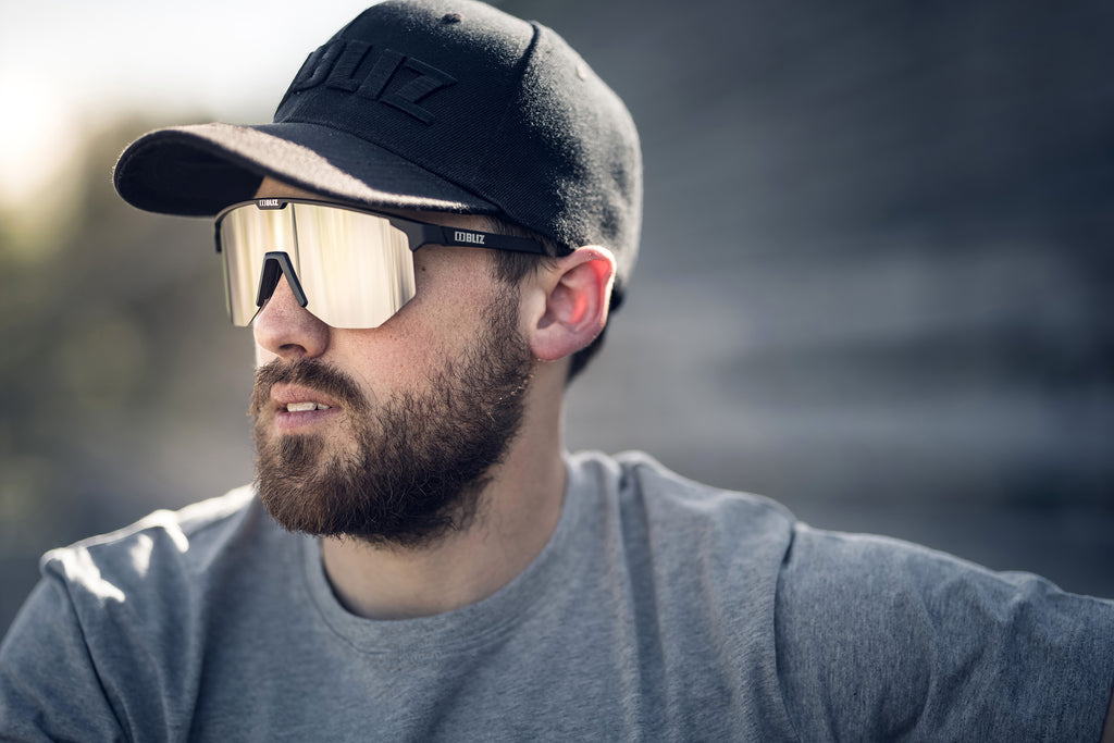 Man wearing BLIZ Hero sunglasses with black frame